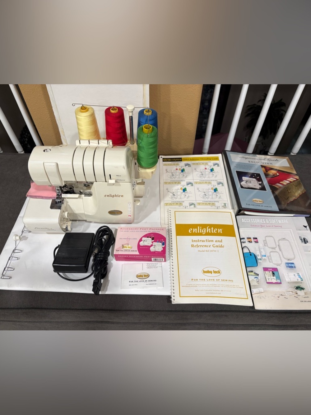 Baby Lock Enlighten Serger in White with Multicolor Thread Cones